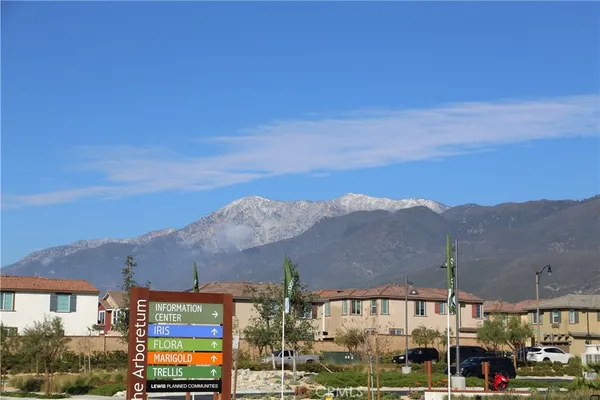 a view of a houses with a city skyline