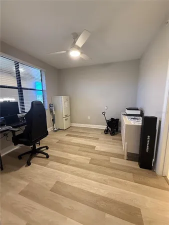 a bathroom with a toilet a sink and a mirror