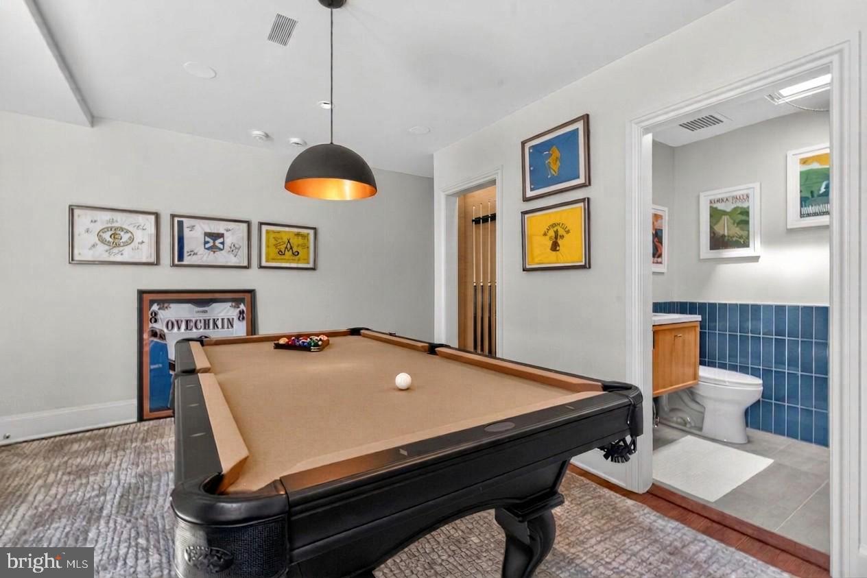 1524 29th Street Northwest Washington, DC 20007 - Photo 20 of 26 a room with pool table and windows