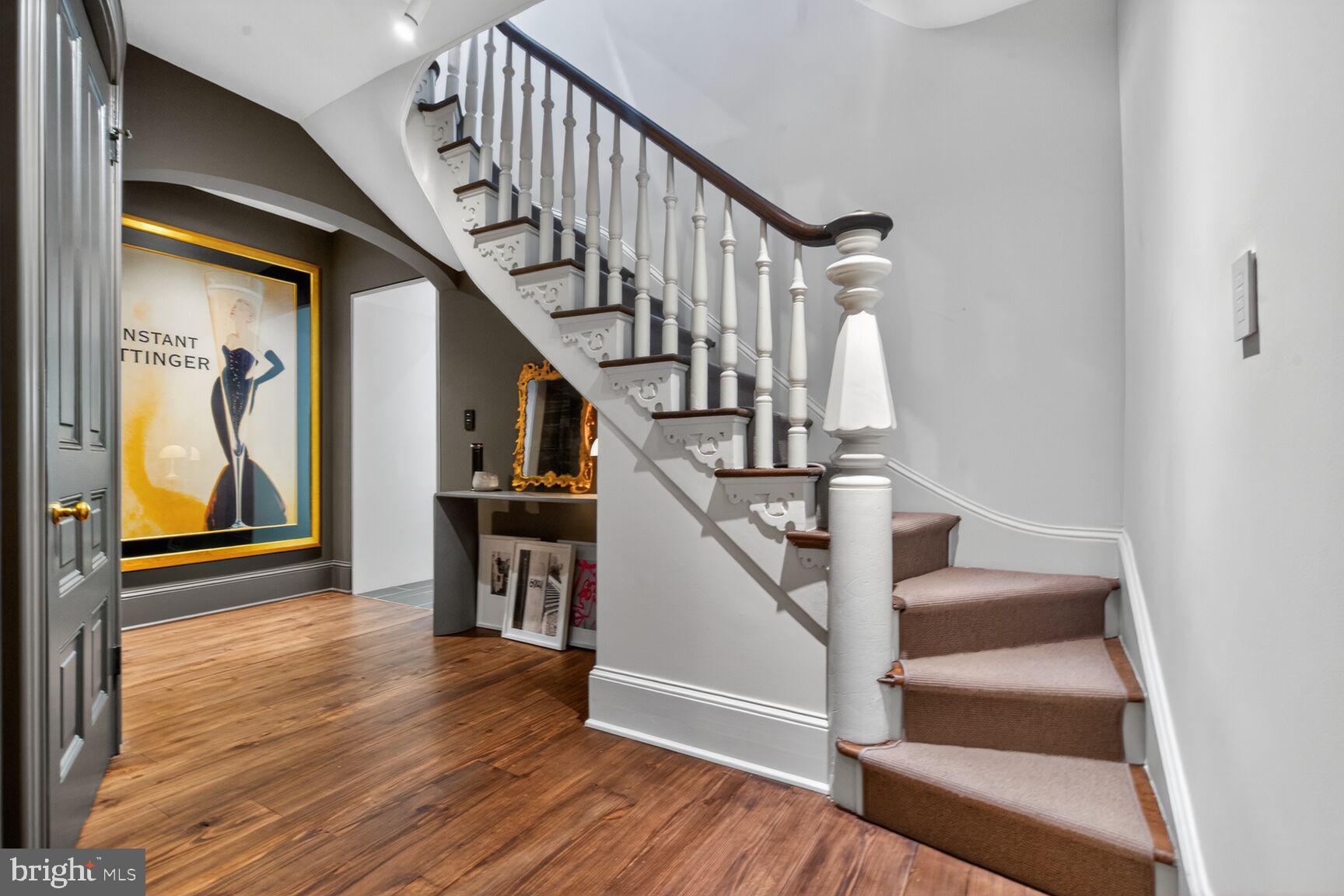 1524 29th Street Northwest Washington, DC 20007 - Photo 4 of 26 a view of entryway and hall with wooden floor