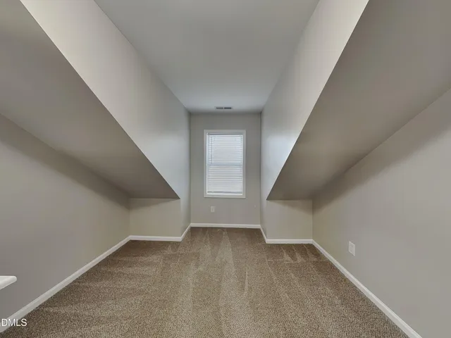wooden floor and window in an empty room