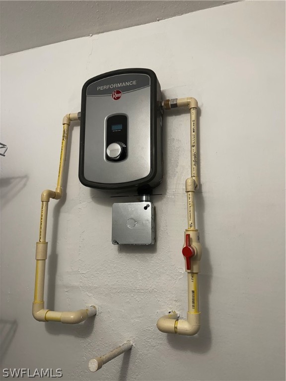 4608 Southeast 6th Avenue, Unit 1D Cape Coral, FL 33904 - Photo 39 of 49 a bathroom with a sink