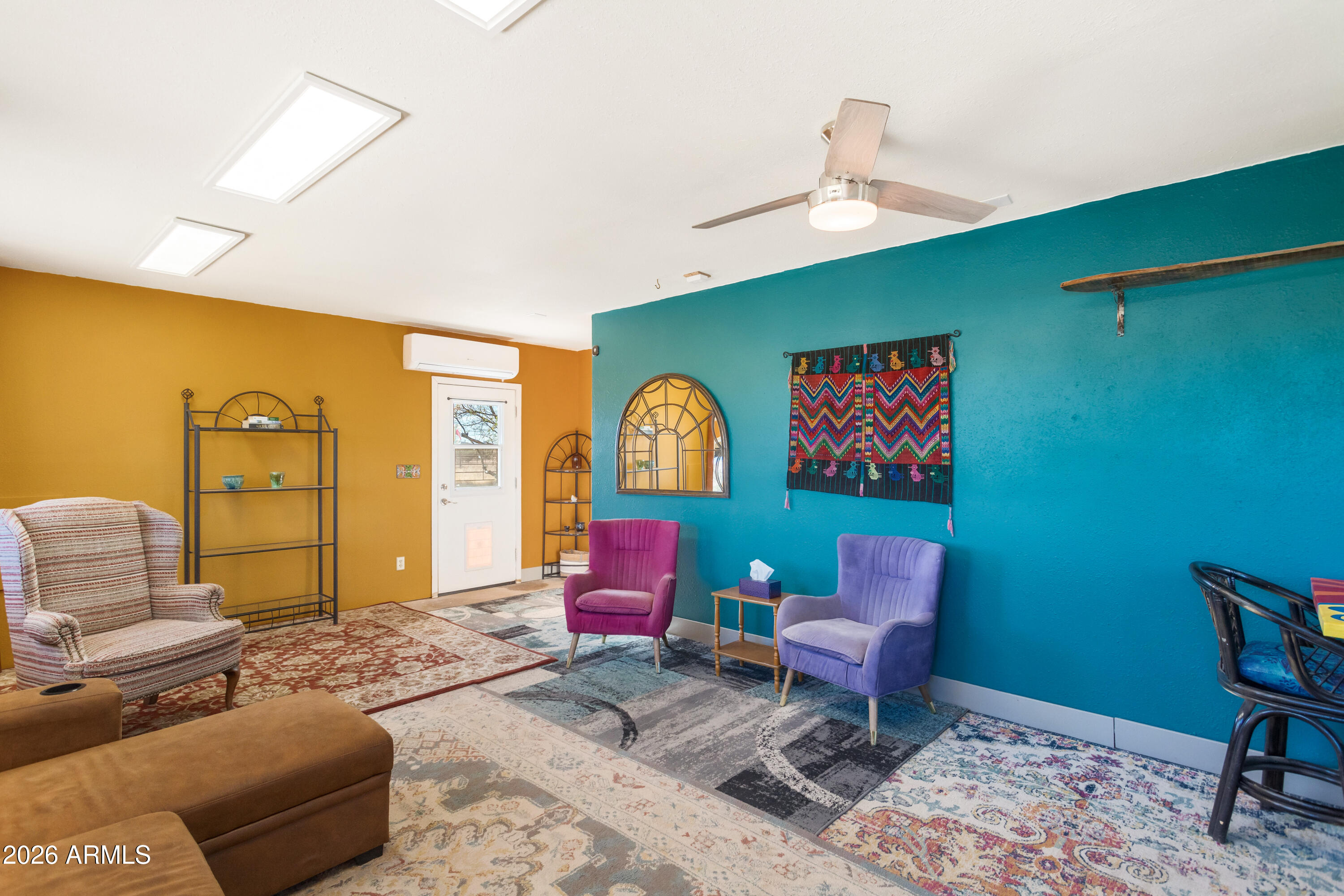 2271 North Sands Ranch Road Huachuca City, AZ 85616 - Photo 14 of 50 a living room with furniture and a wooden floor