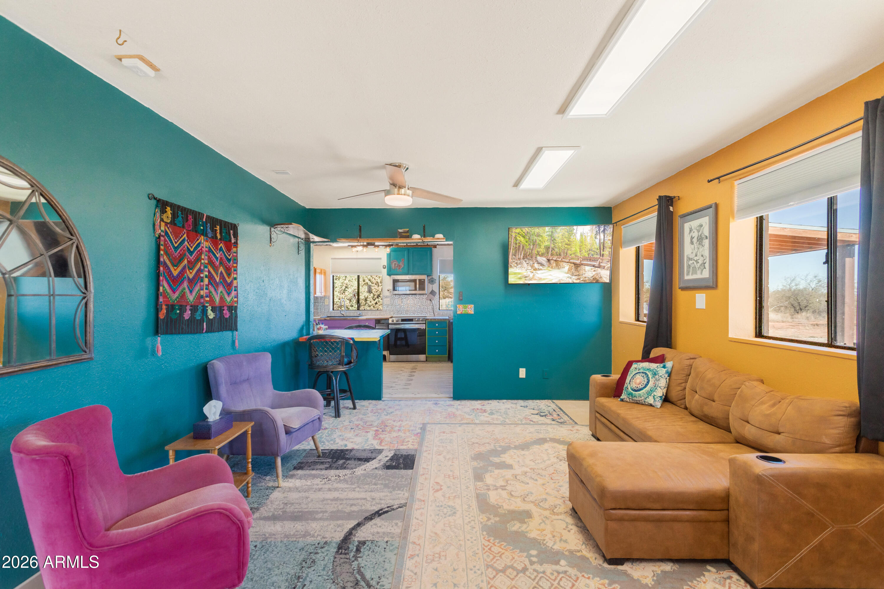 2271 North Sands Ranch Road Huachuca City, AZ 85616 - Photo 16 of 50 a bedroom with furniture and a large window