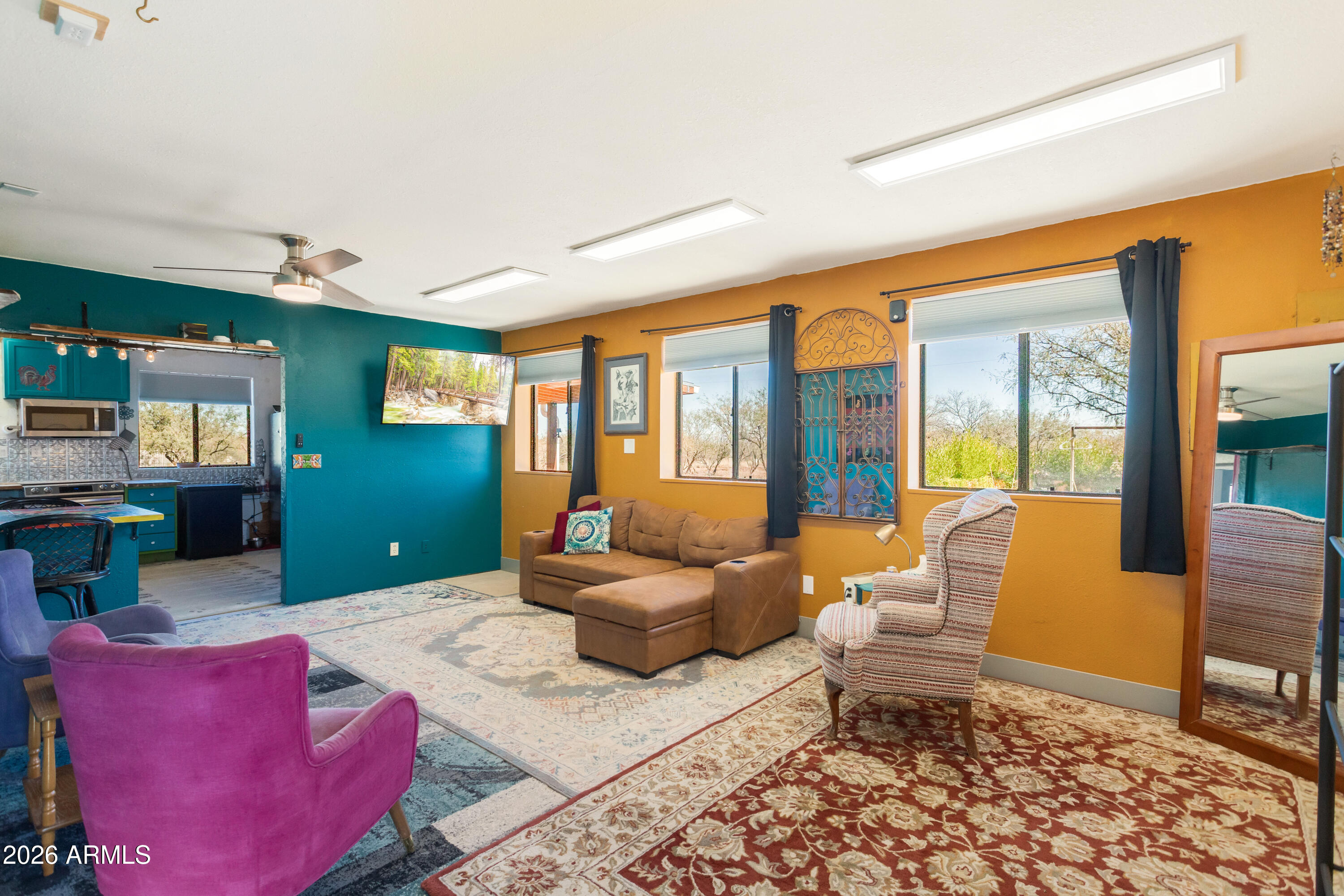 2271 North Sands Ranch Road Huachuca City, AZ 85616 - Photo 19 of 50 a living room with furniture and a rug