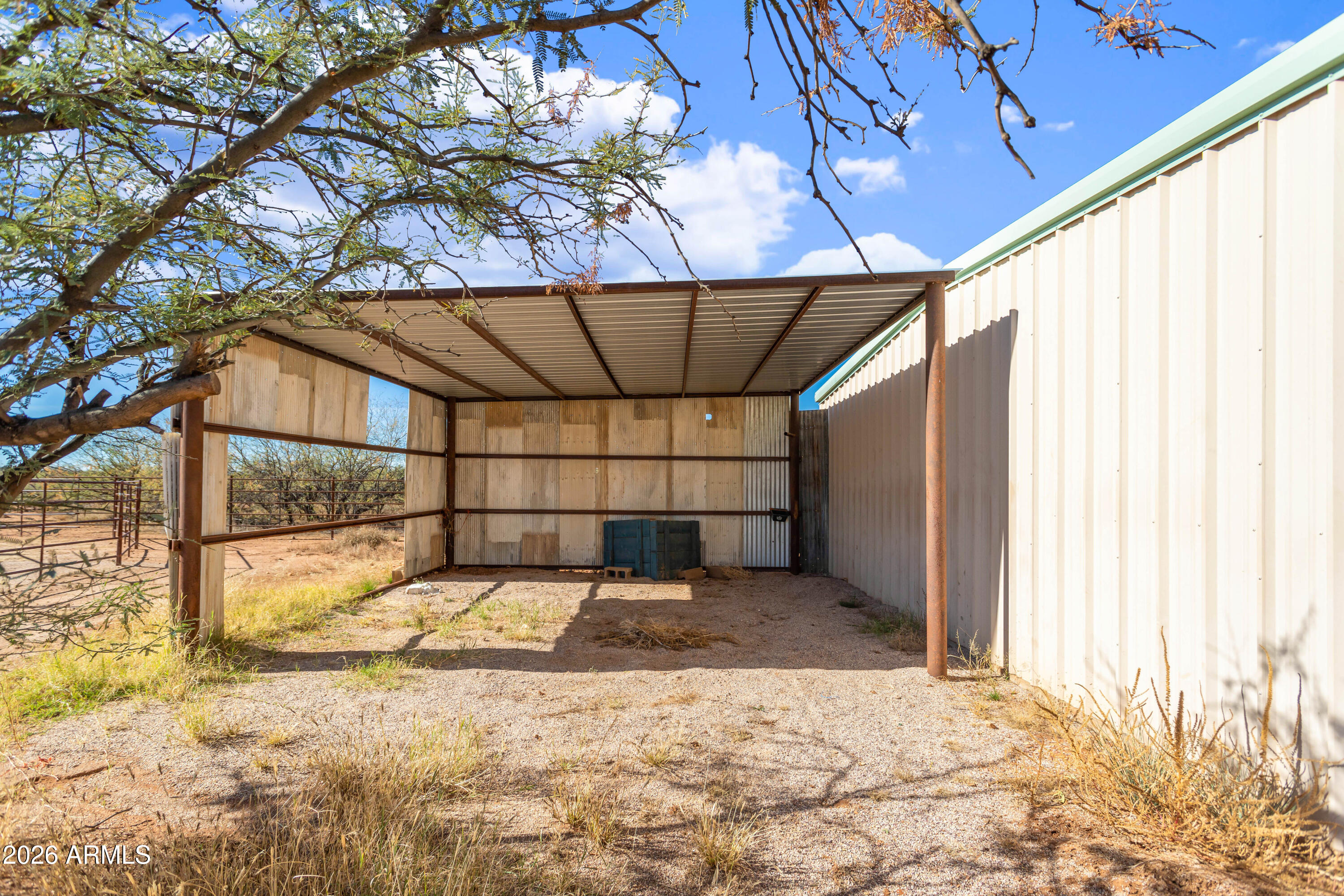 2271 North Sands Ranch Road Huachuca City, AZ 85616 - Photo 28 of 50 a view of a backyard of a house