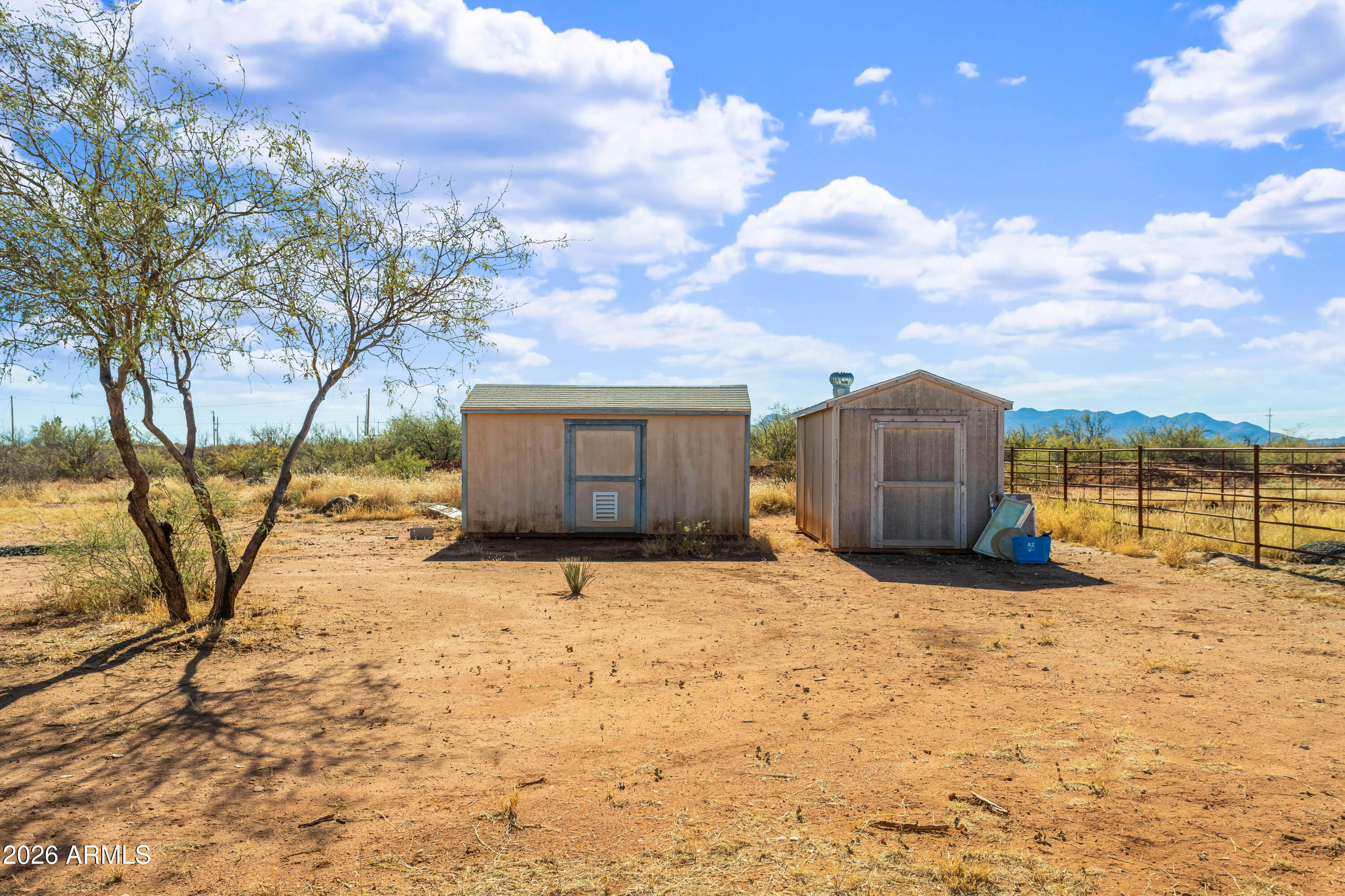 2271 North Sands Ranch Road Huachuca City, AZ 85616 - Photo 40 of 50 a view of a house with a snow in the yard