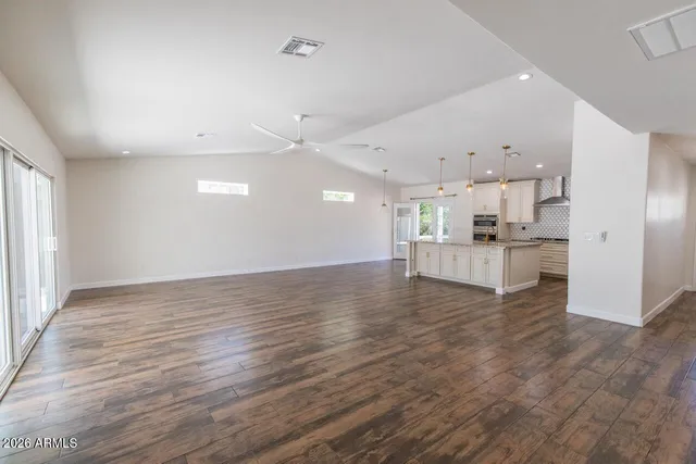 a view of kitchen with wooden floor