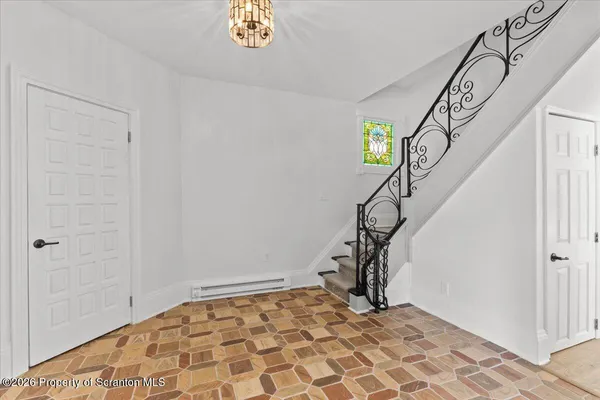 a view of an entryway with staircase