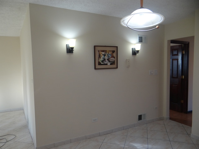 4212 North Ottawa Avenue Norridge, IL 60706 - Photo 5 of 7 an empty room with a window