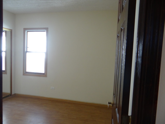 4212 North Ottawa Avenue Norridge, IL 60706 - Photo 6 of 7 an empty room with a window