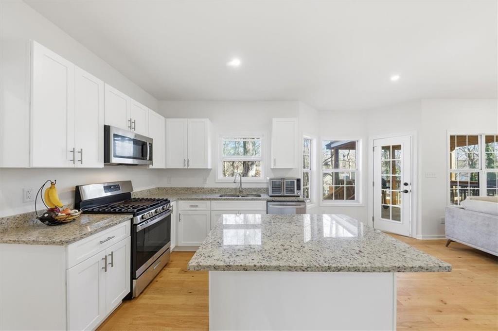 2769 Springfount Trail Northeast Lawrenceville, GA 30043 - Photo 11 of 56 a kitchen with granite countertop lots of counter top space