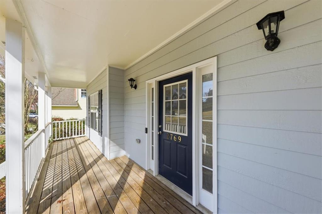2769 Springfount Trail Northeast Lawrenceville, GA 30043 - Photo 2 of 56 a view of a bedroom with a balcony