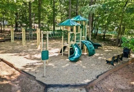 a view of a house with backyard from a patio