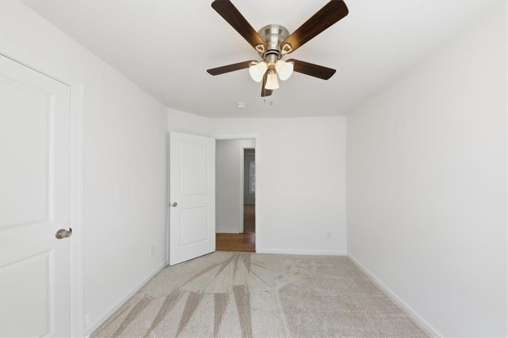 2769 Springfount Trail Northeast Lawrenceville, GA 30043 - Photo 23 of 56 a view of a livingroom with a ceiling fan