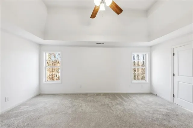 a view of an empty room and window