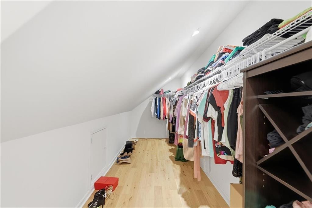 2769 Springfount Trail Northeast Lawrenceville, GA 30043 - Photo 37 of 56 a view of walk in closet with clothes and shoes