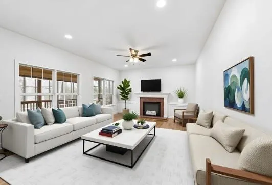 a living room with furniture fireplace and a flat screen tv