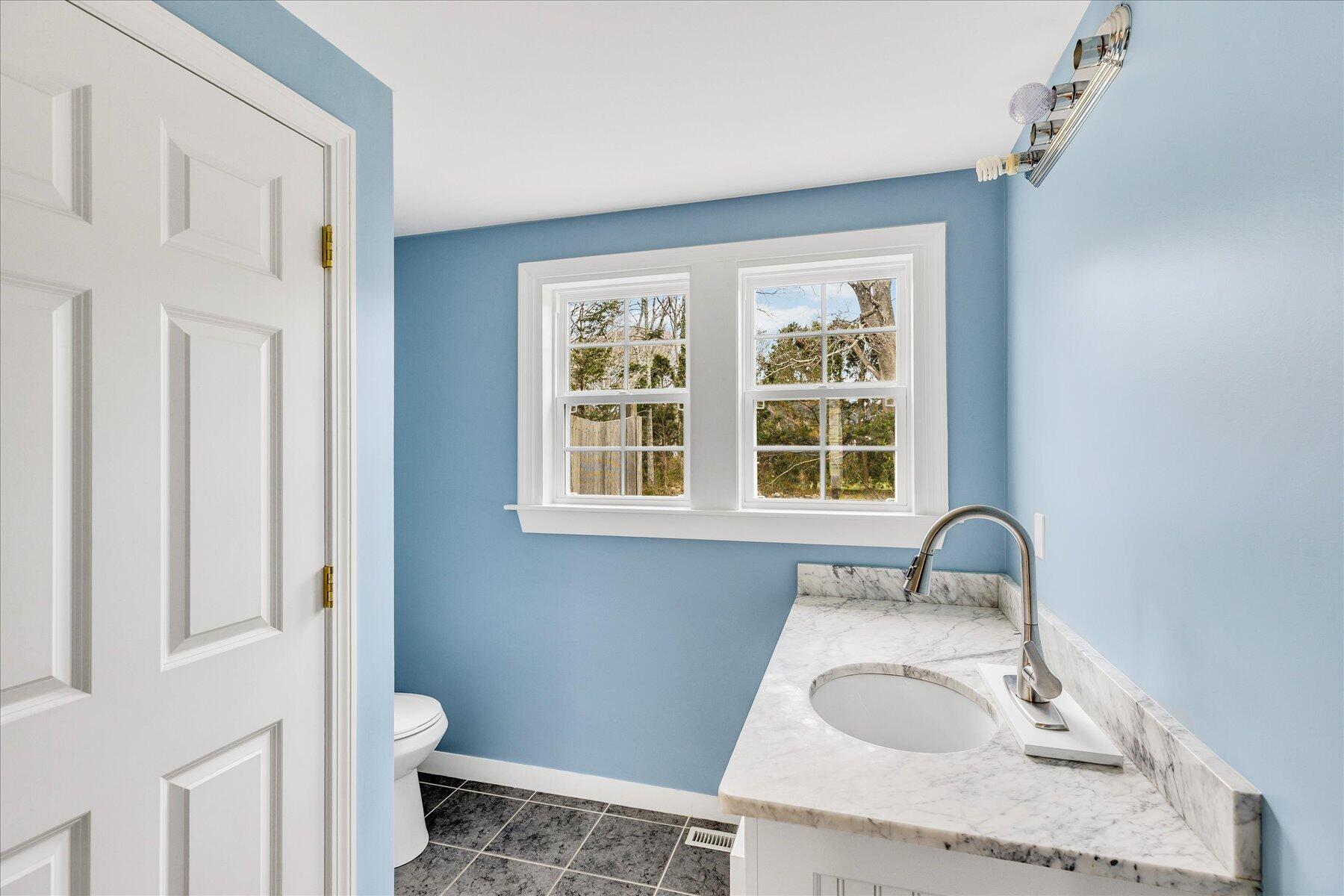 5 Dale Terrace Extension Sandwich, MA 02563 - Photo 11 of 31 a bathroom with a sink toilet and a window