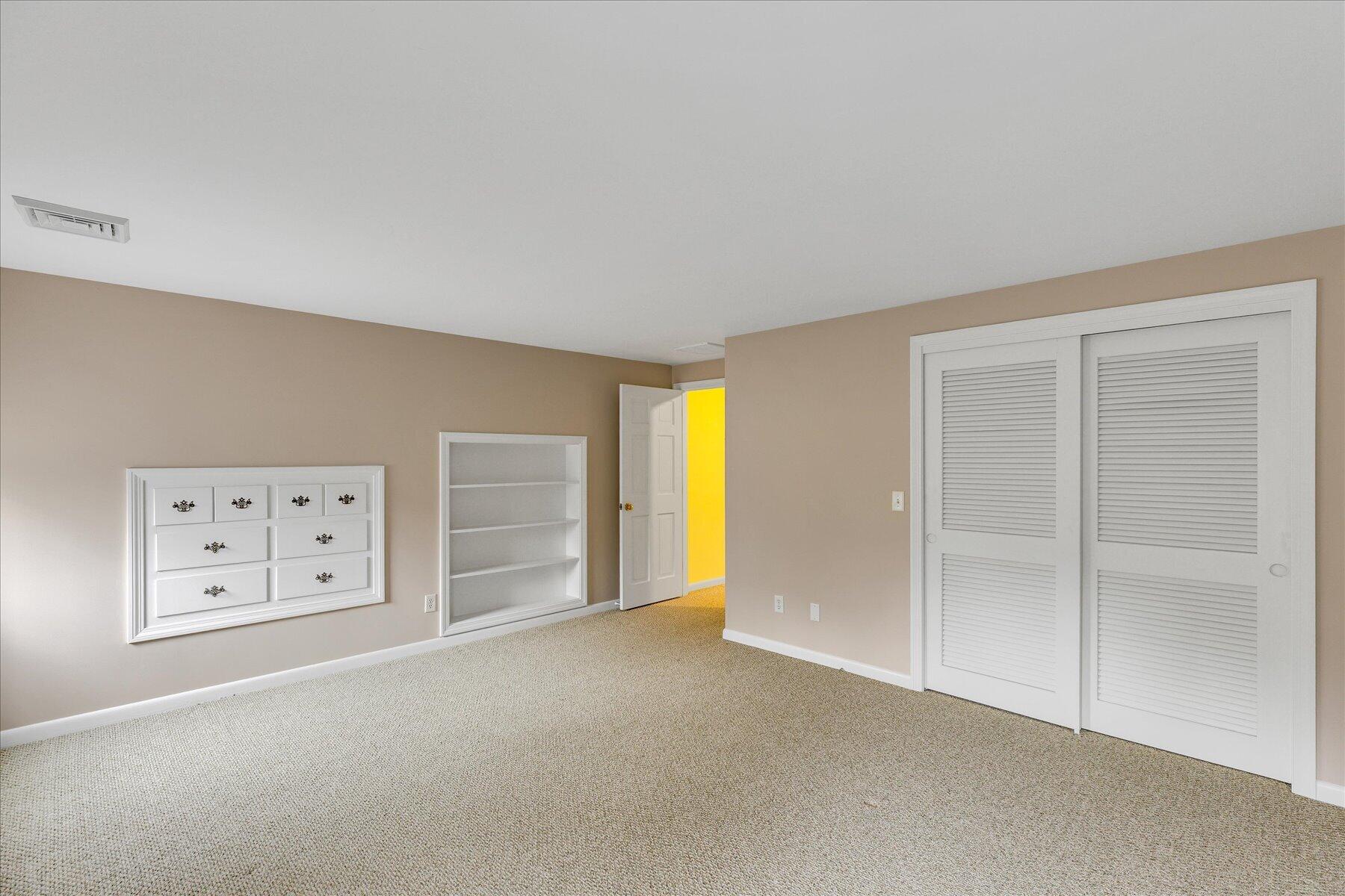 5 Dale Terrace Extension Sandwich, MA 02563 - Photo 22 of 31 an empty room with wall painting and closet