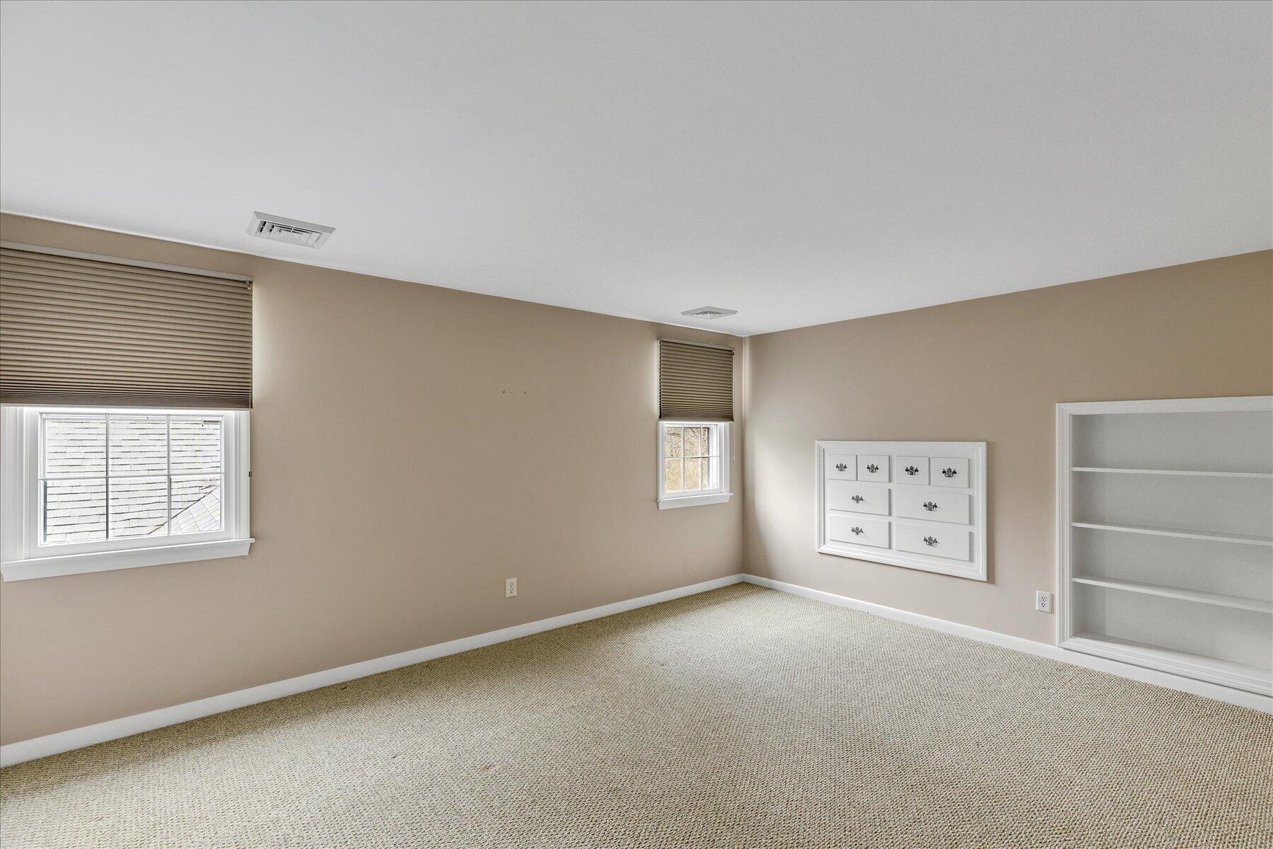 5 Dale Terrace Extension Sandwich, MA 02563 - Photo 23 of 31 an empty room with windows and closet