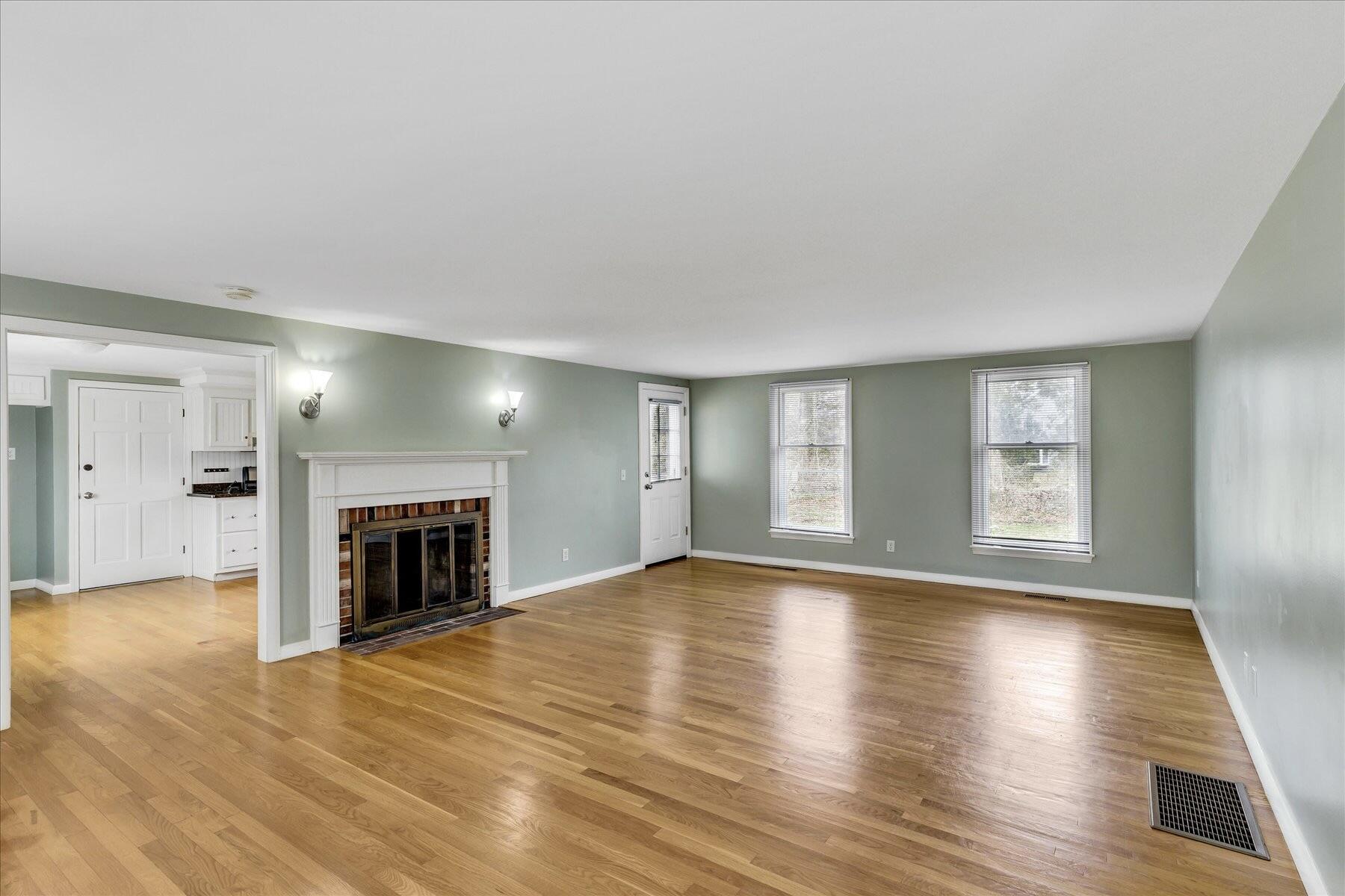 5 Dale Terrace Extension Sandwich, MA 02563 - Photo 6 of 31 a view of an empty room with window and fire place