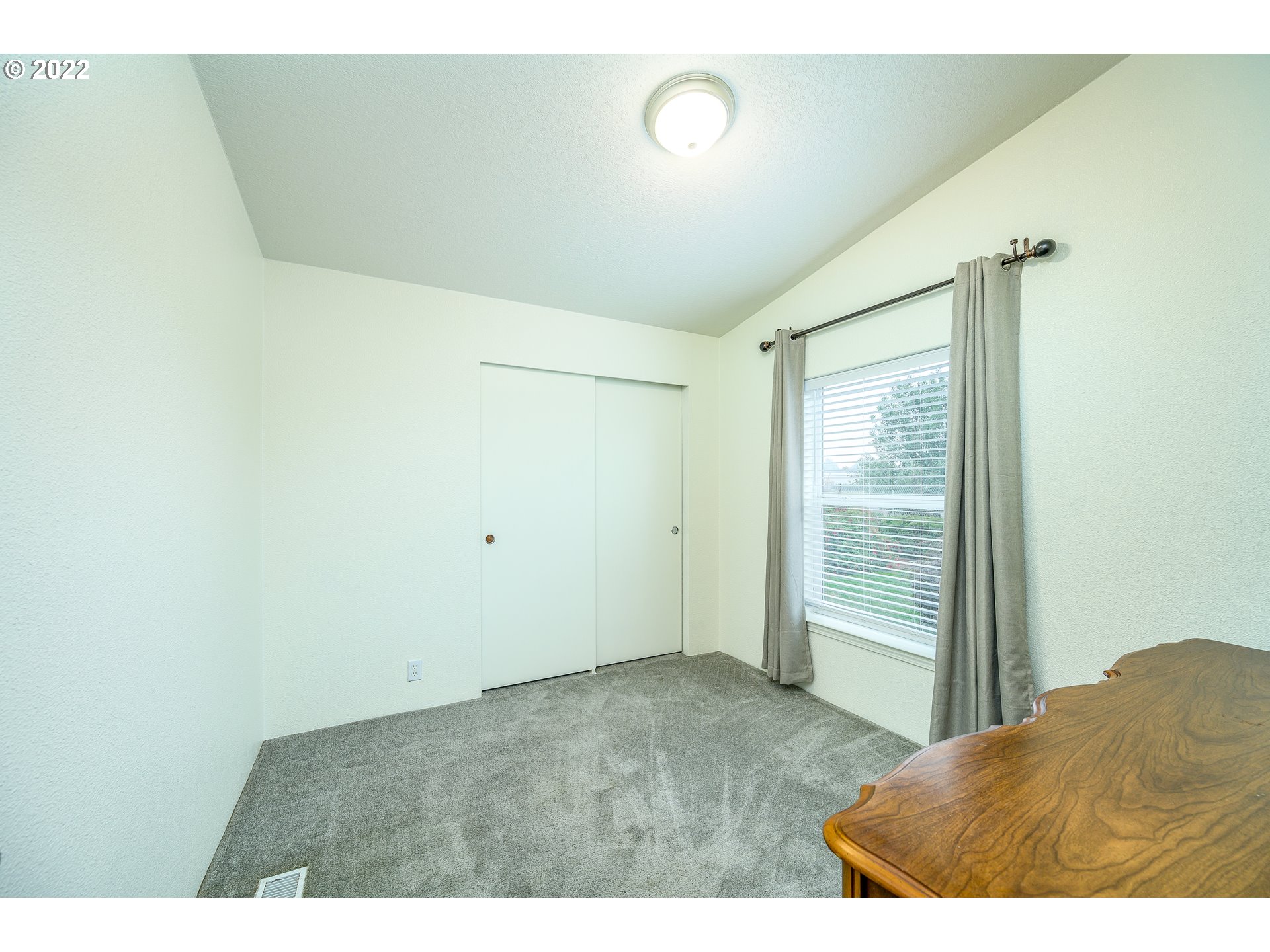 17600 Northeast Boones Ferry Road Northeast Hubbard, OR 97032 - Photo 14 of 28 a view of an empty room and window