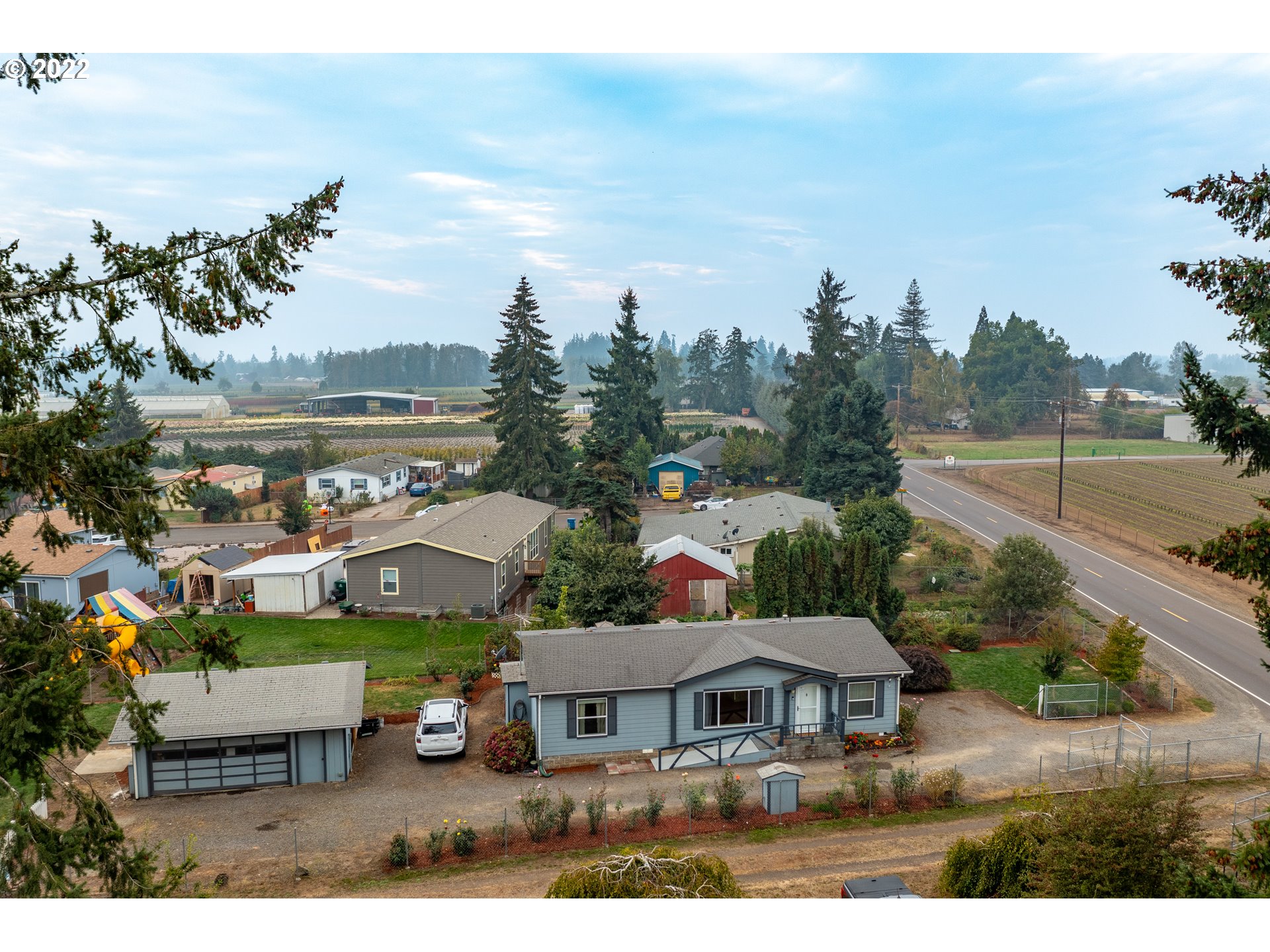 17600 Northeast Boones Ferry Road Northeast Hubbard, OR 97032 - Photo 24 of 28 a view of house and outdoor space