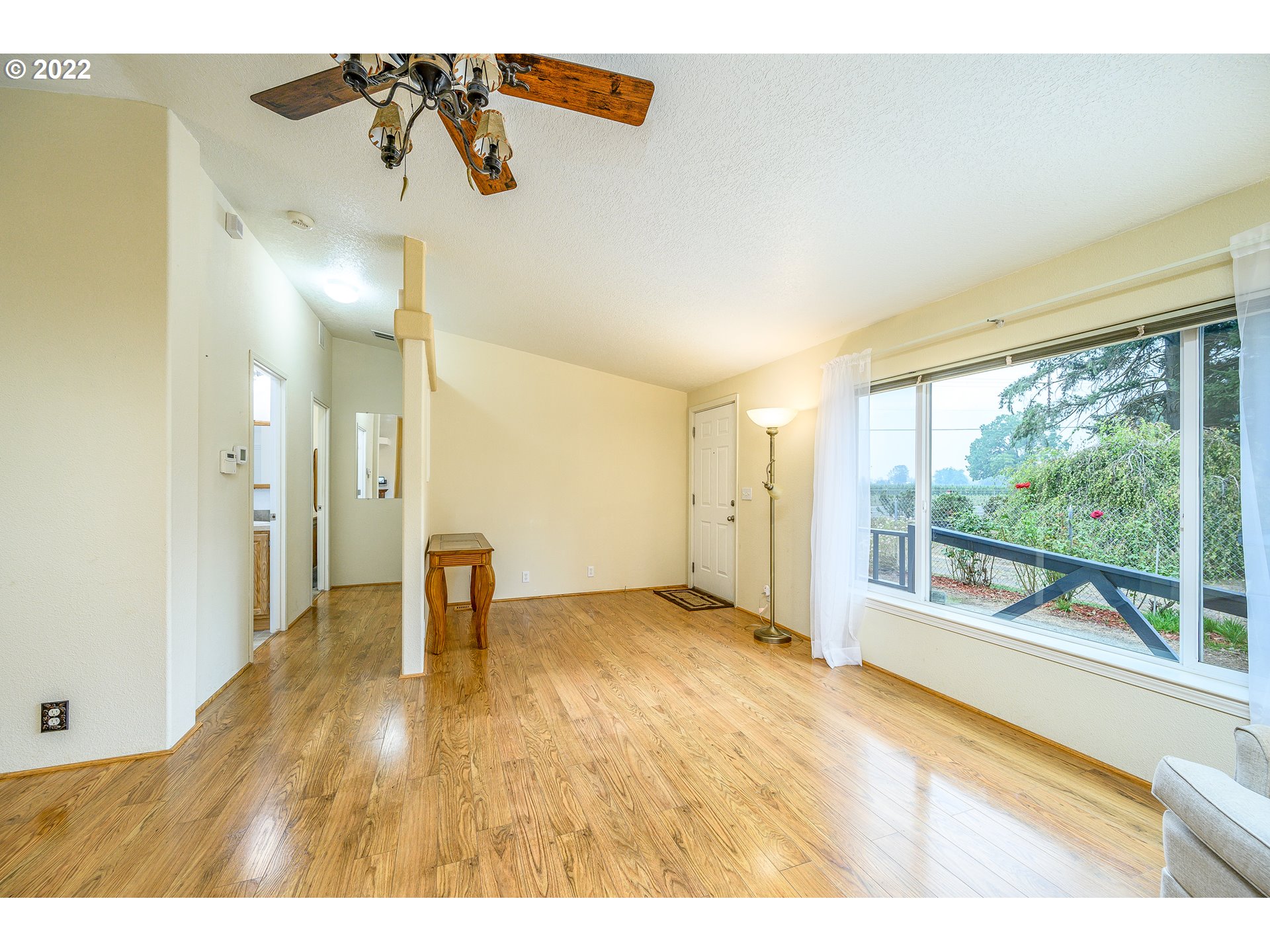 17600 Northeast Boones Ferry Road Northeast Hubbard, OR 97032 - Photo 5 of 28 a view of a room with a sink and wooden floor