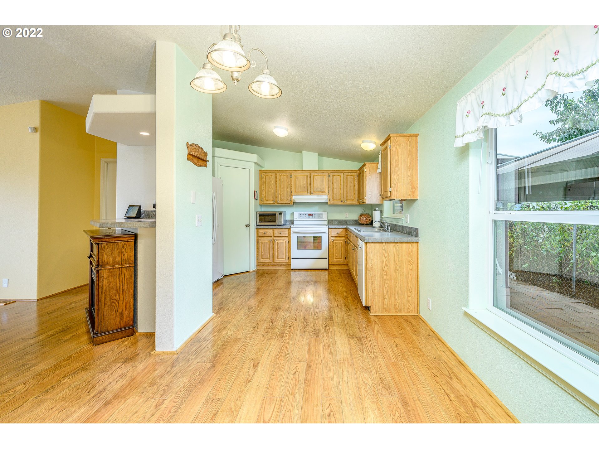 17600 Northeast Boones Ferry Road Northeast Hubbard, OR 97032 - Photo 8 of 28 a view of kitchen with wooden floor