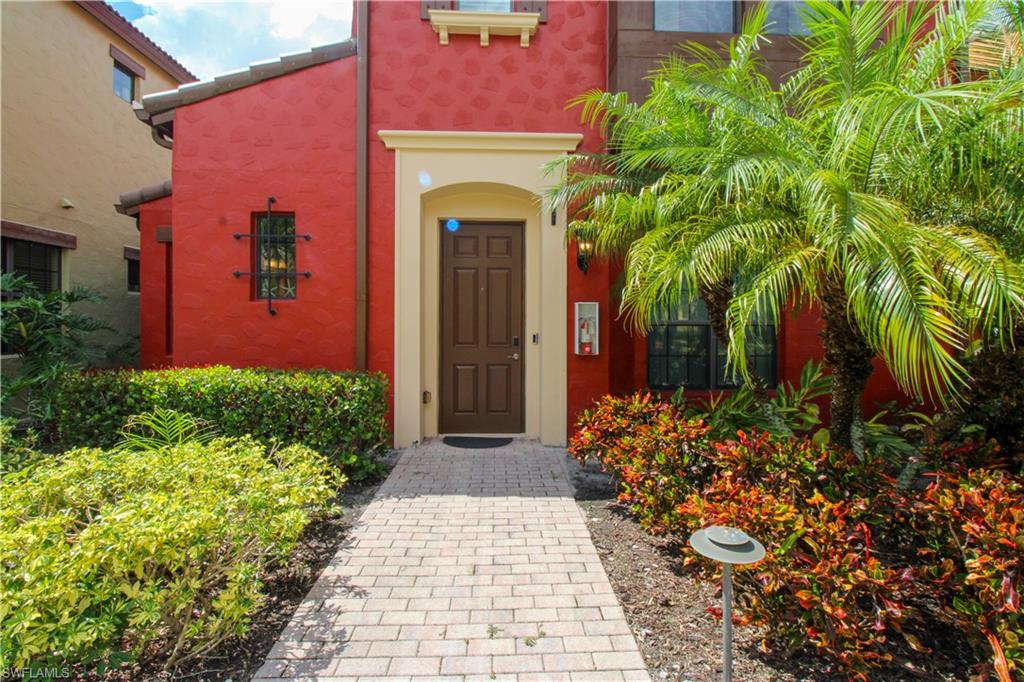 9025 Alturas Street, Unit 3102 Naples, FL 34113 - Photo 7 of 36 a front view of a house