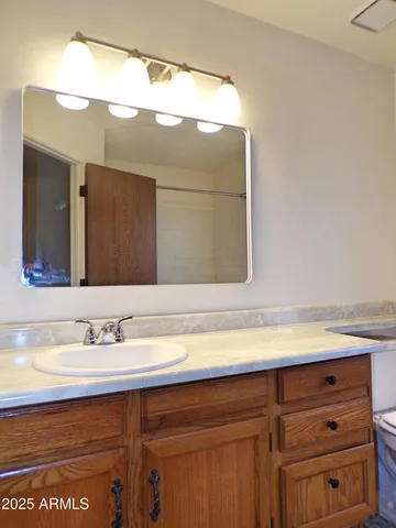 a sink with a mirror