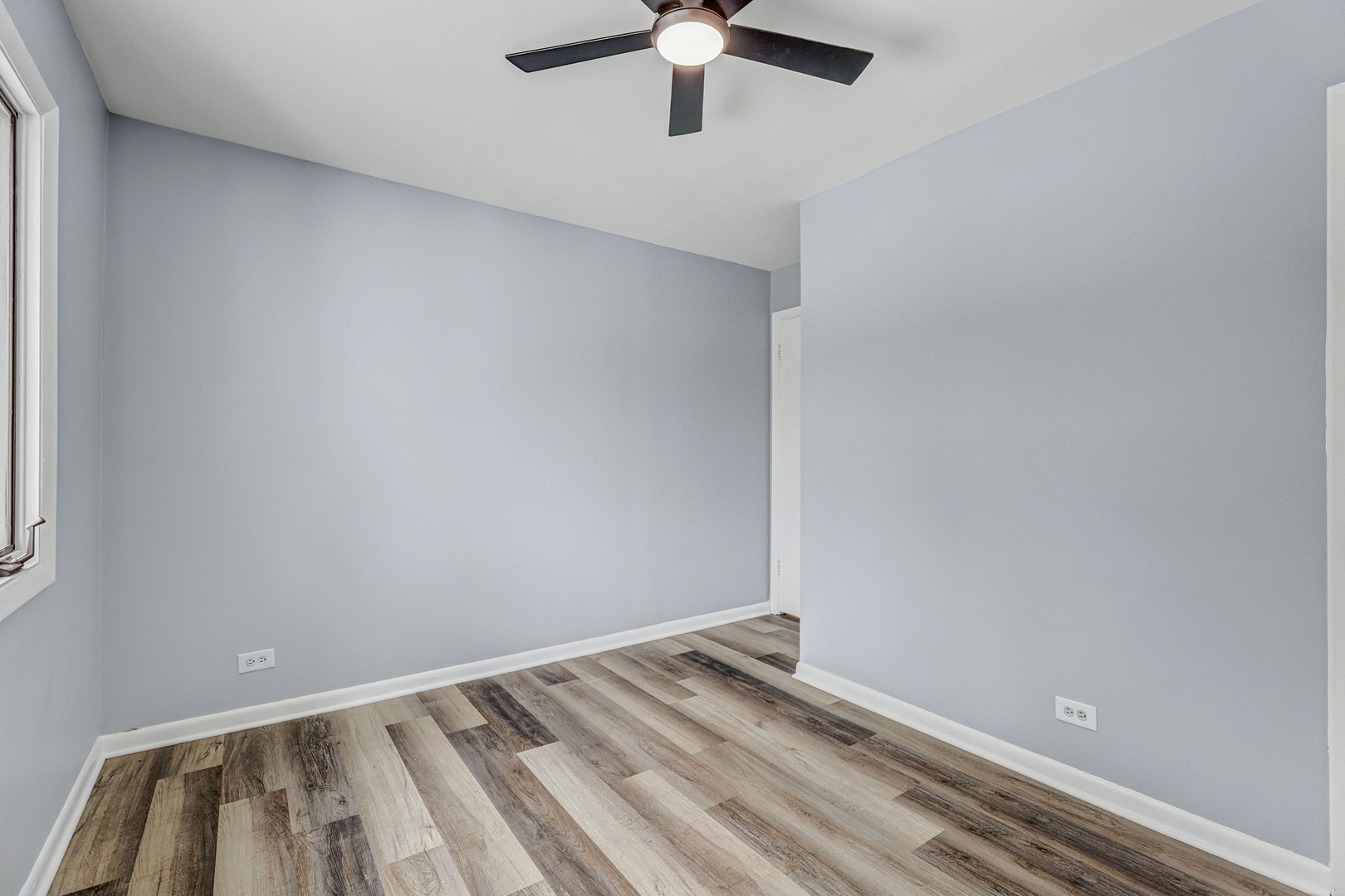 7001 Meadow Lane Road Long Grove, IL 60060 - Photo 20 of 48 wooden floor in an empty room