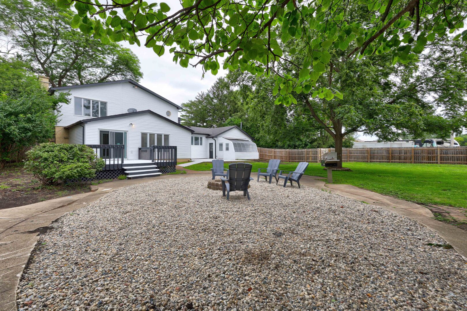 7001 Meadow Lane Road Long Grove, IL 60060 - Photo 2 of 48 a house view with a garden space