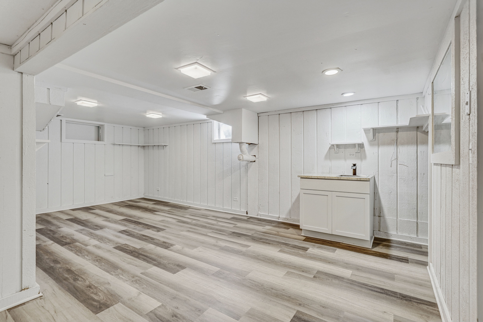 7001 Meadow Lane Road Long Grove, IL 60060 - Photo 35 of 48 a bathroom with a sink and a mirror