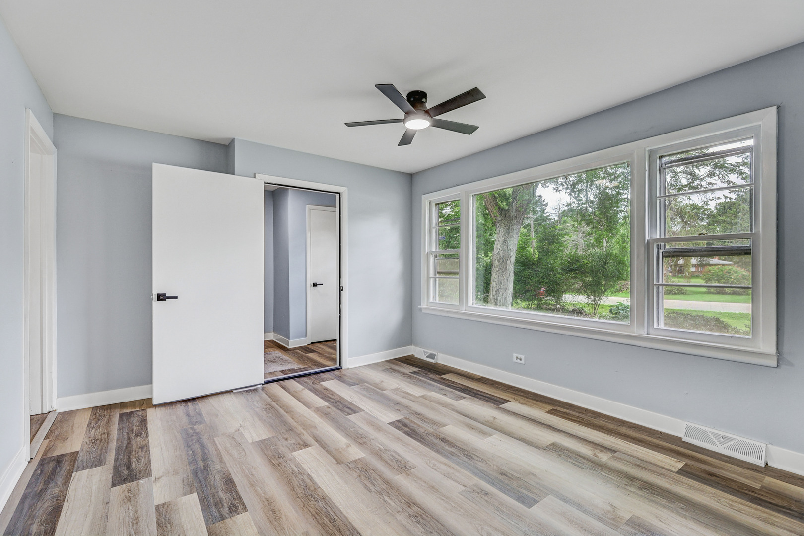 7001 Meadow Lane Road Long Grove, IL 60060 - Photo 8 of 48 a view of an empty room with a window