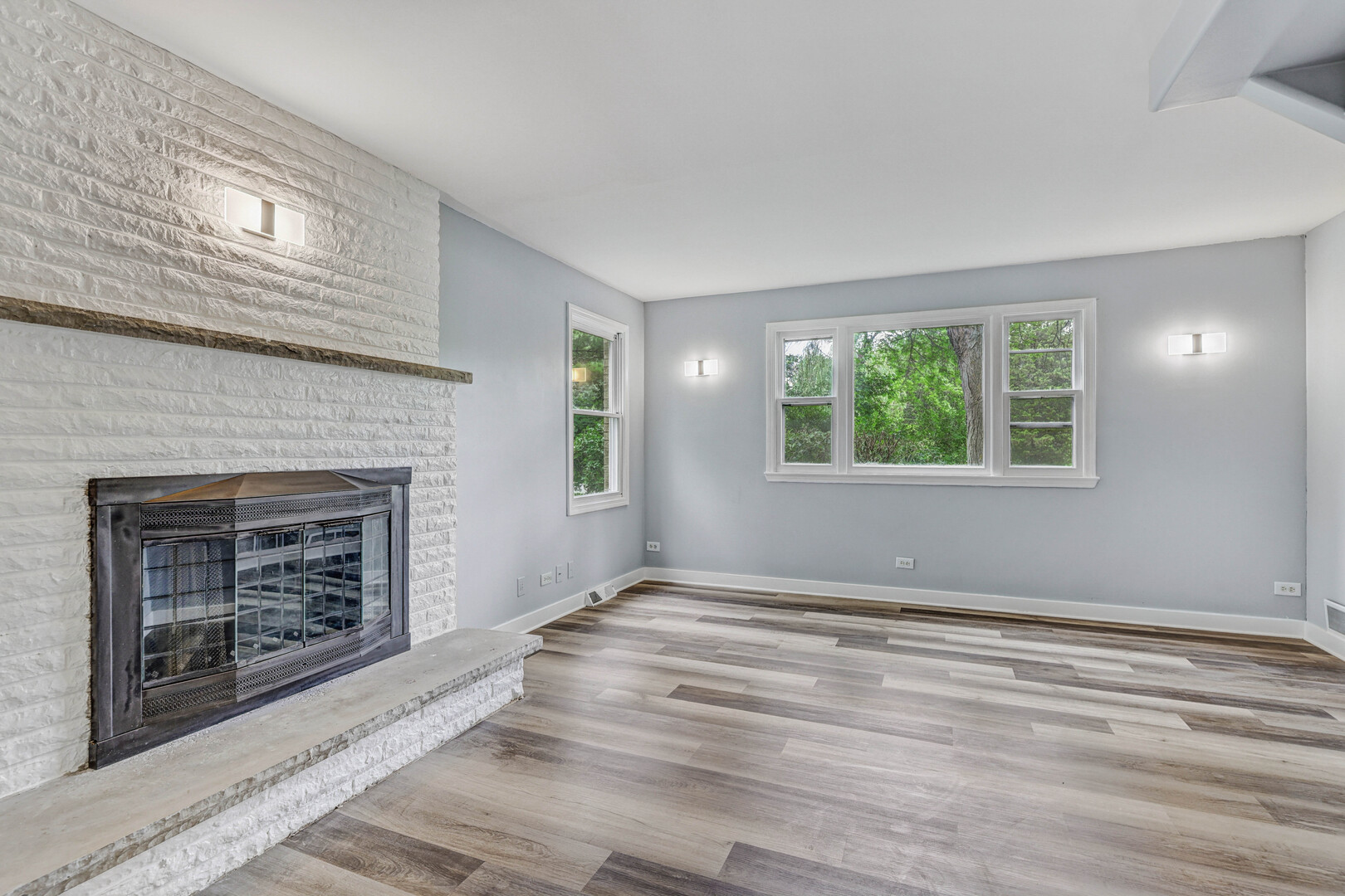 7001 Meadow Lane Road Long Grove, IL 60060 - Photo 10 of 48 a view of an empty room with window and fire place