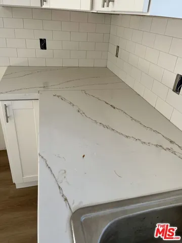 a utility room with a sink