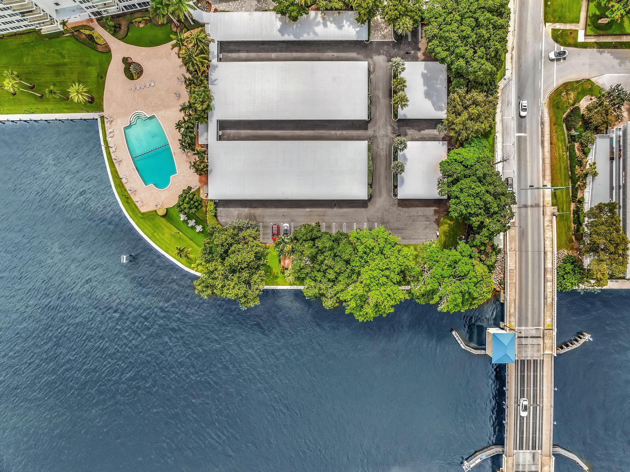 701 East Camino Real, Unit 12G Boca Raton, FL 33432 - Photo 48 of 82 an aerial view of a house with a garden and plants