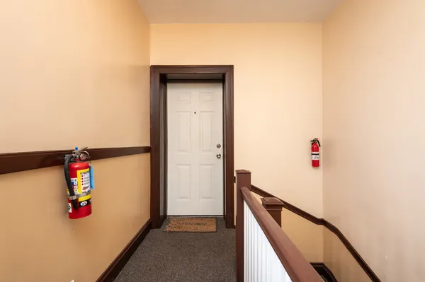 a view of hallway with stairs