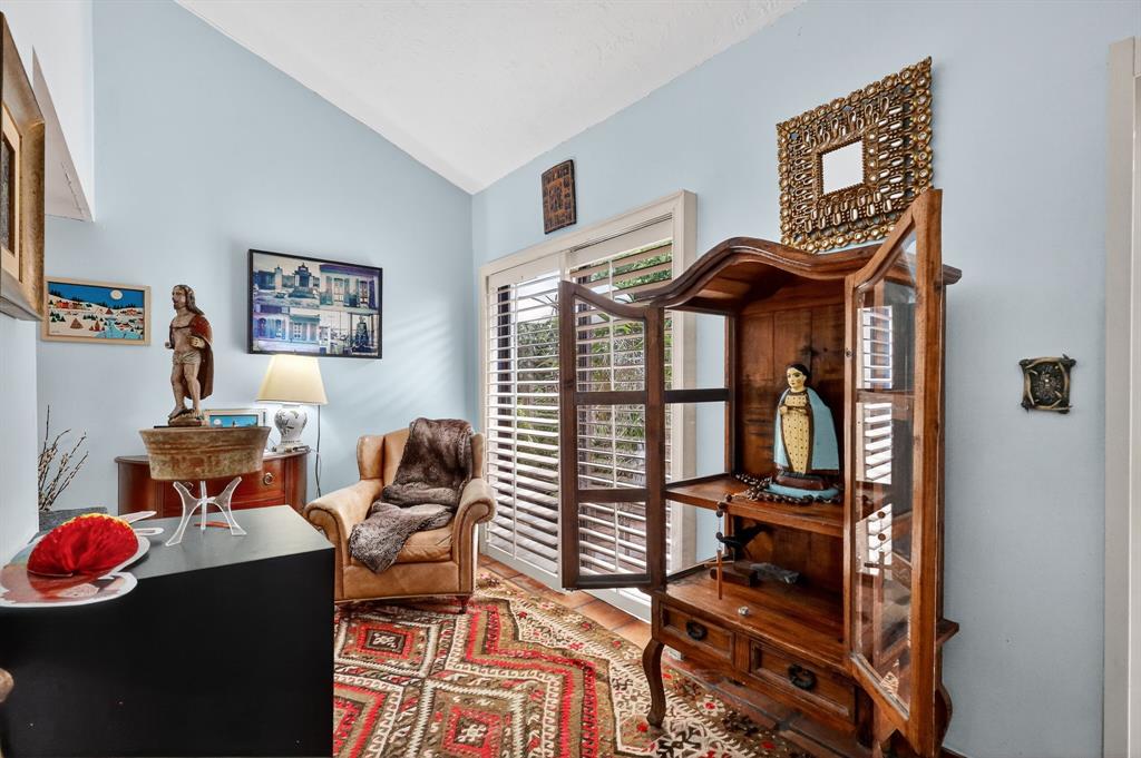 13501 Southwest 62nd Street, Unit 1 Miami, FL 33183 - Photo 11 of 38 a bedroom with furniture and a window