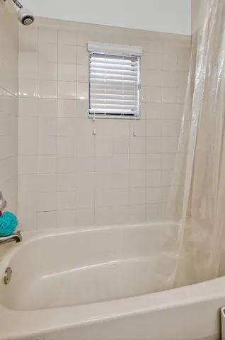 a bathroom with a bathtub