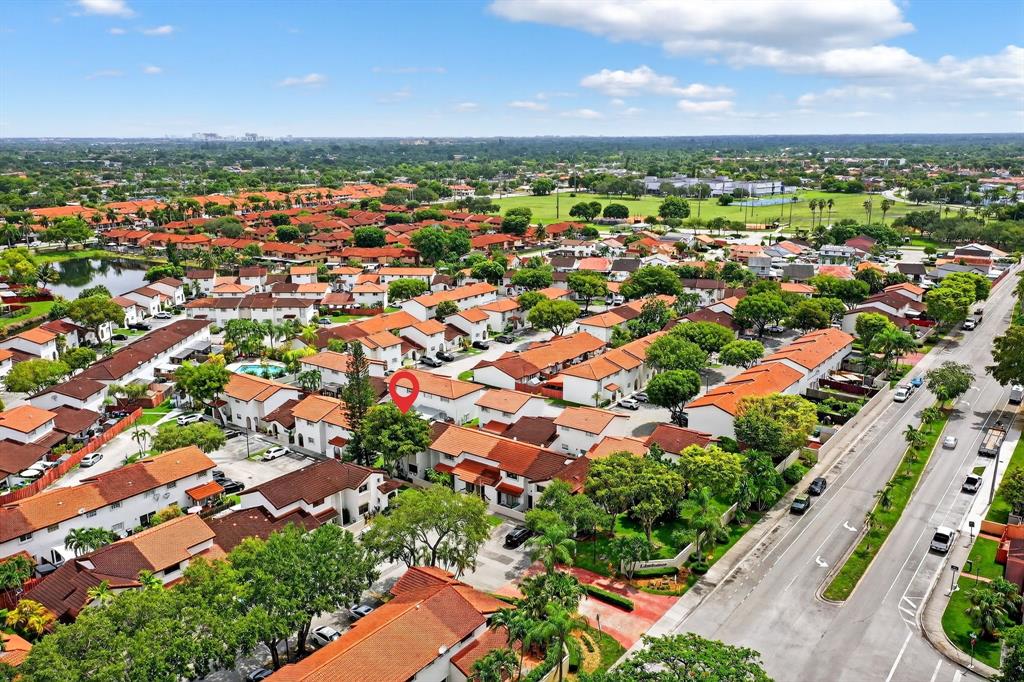 13501 Southwest 62nd Street, Unit 1 Miami, FL 33183 - Photo 33 of 38 an aerial view of residential houses with outdoor space