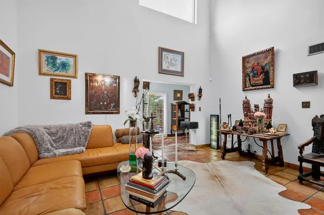 a living room with furniture and a couch