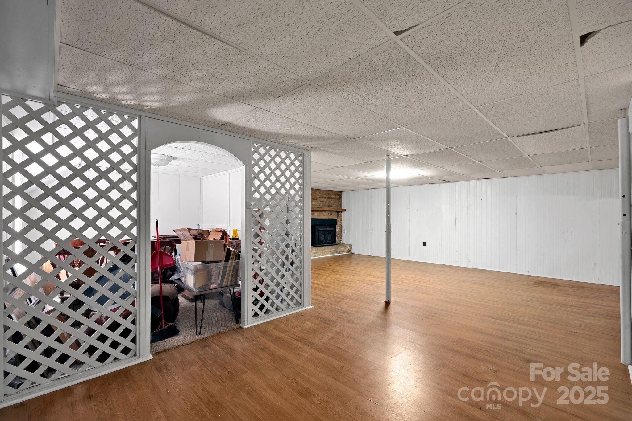3168 Sossamon Place Concord, NC 28025 - Photo 24 of 37 a view of a livingroom with wooden floor