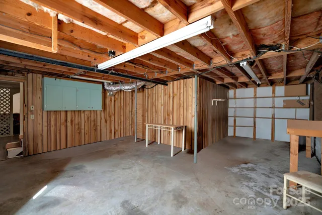 a view of a two chairs in the balcony
