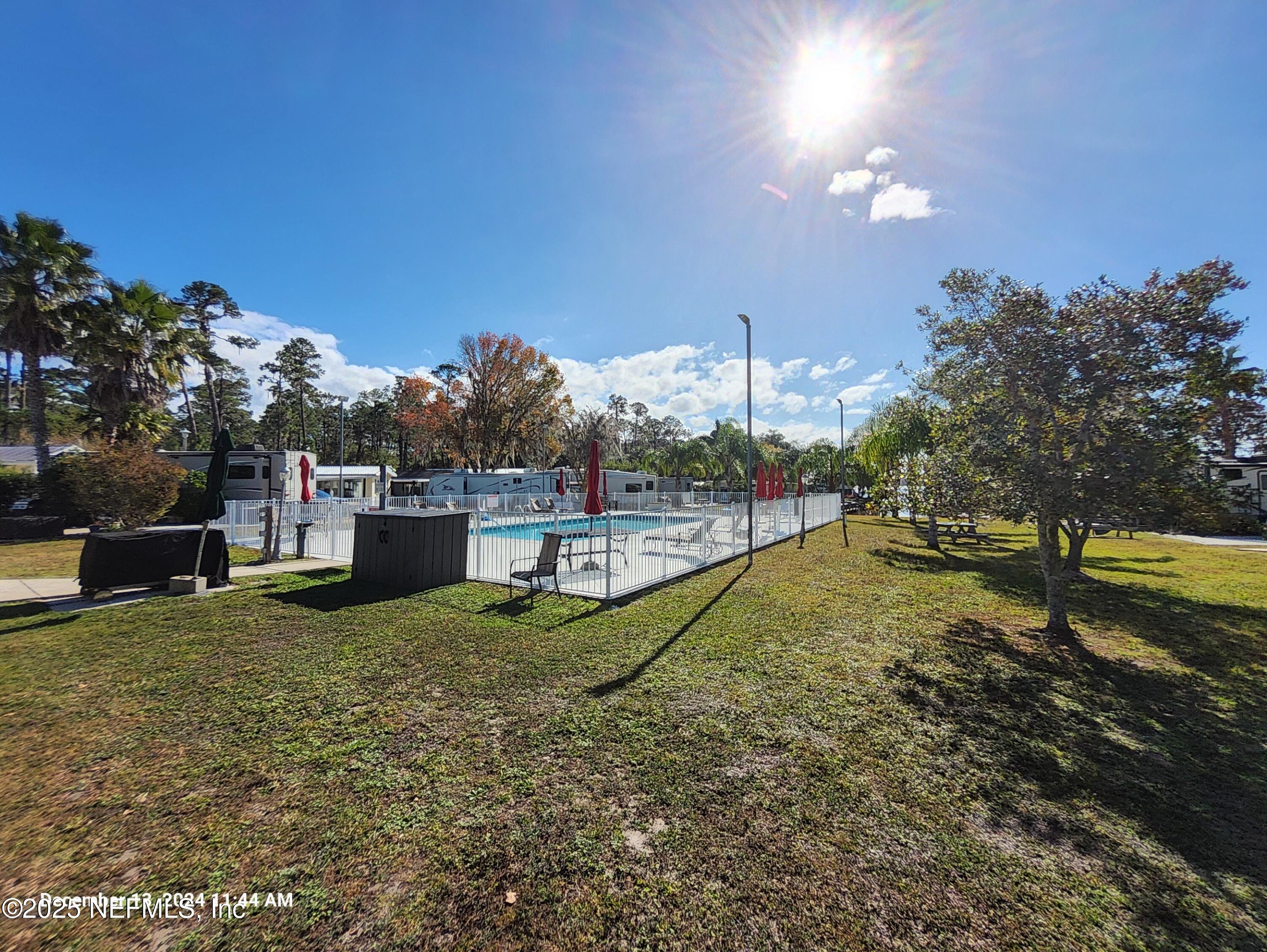 1074 Front Street, Unit 50B Welaka, FL 32193 - Photo 14 of 20 a view of a garden with a slide