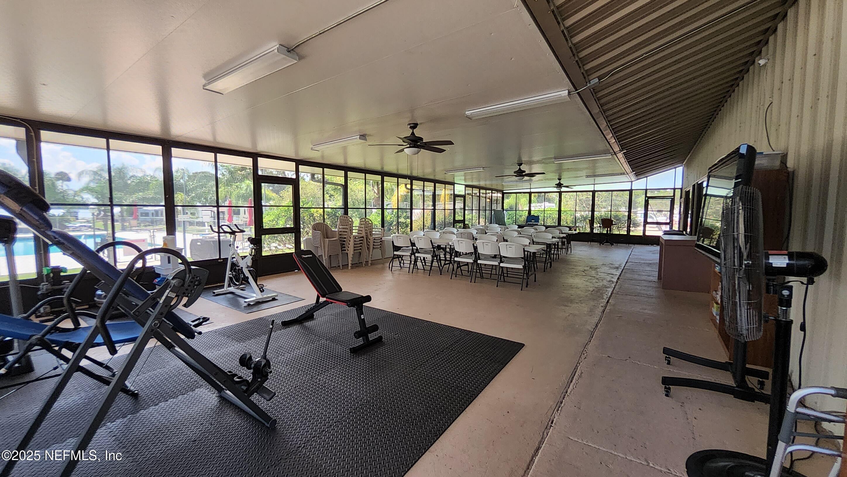 1074 Front Street, Unit 50B Welaka, FL 32193 - Photo 18 of 20 a view of a room with gym equipment