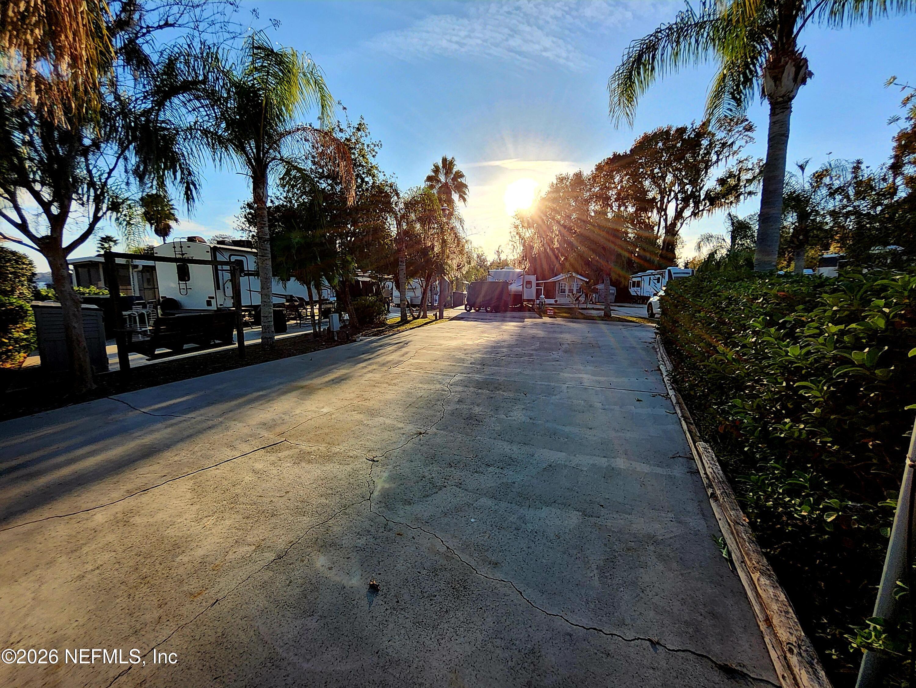 1074 Front Street, Unit 50B Welaka, FL 32193 - Photo 6 of 20 a view of a street with a building in the background