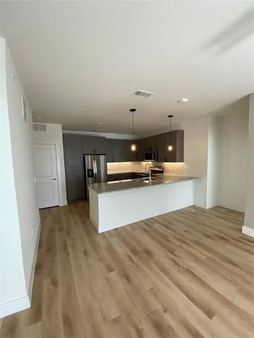 a view of kitchen and living room